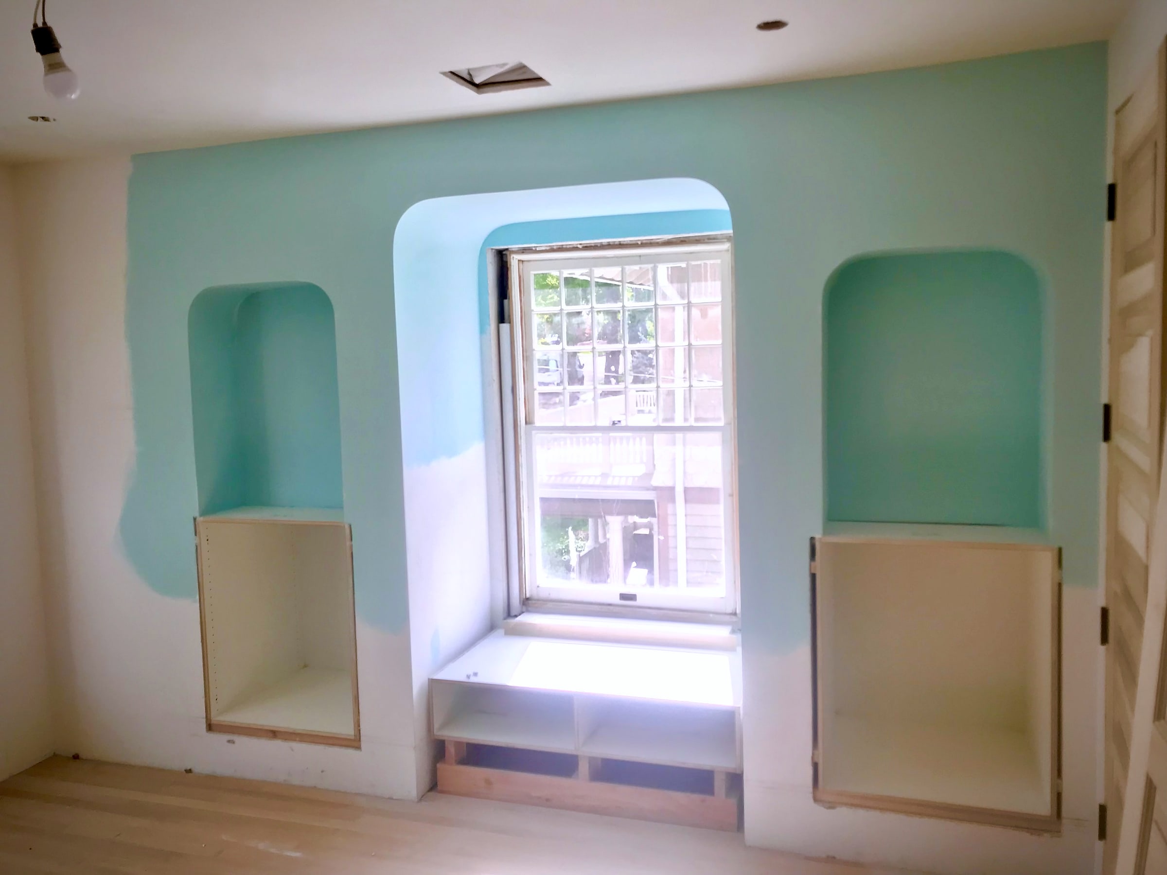 Ten inch radius corners on niches and a window return in a Pine Street home